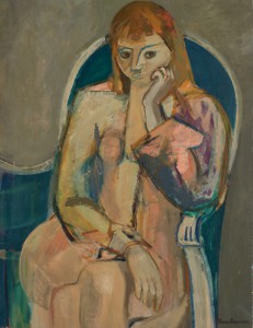 Femme sur canapé vert